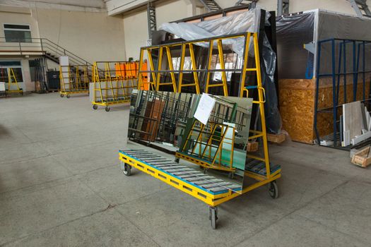 The interior of a large glass and mirror cutting factory