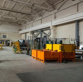 The interior of a large glass and mirror cutting factory