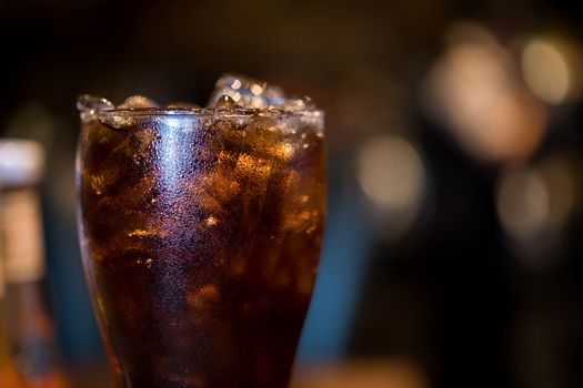 glass of cola with ice