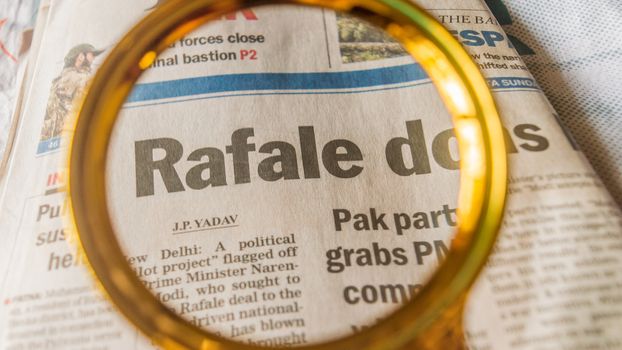 Kolkata, India, 18th March, 2019: The word Rafale under scanner in an english newspaper.