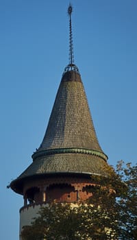 Top of tower with round tall roof