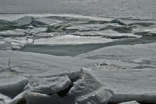 Blocks of ice on the surface of Engolasters lake in Andorra