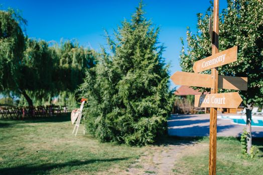 wedding ceremony area, arch chairs decor with trees