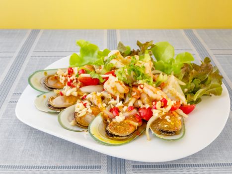 seafood dish with green mussel and  spicy sauce