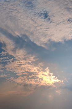 White fluffy clouds on a blue sky background