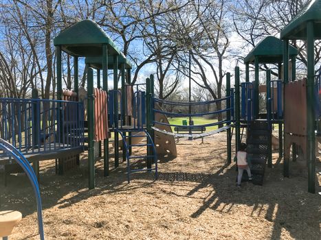 Colorful playground at sunny day of wintertime in Lewisville, Texas, USA.