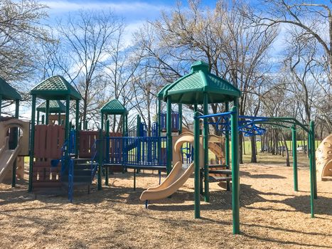 Colorful playground at sunny day of wintertime in Lewisville, Texas, USA.