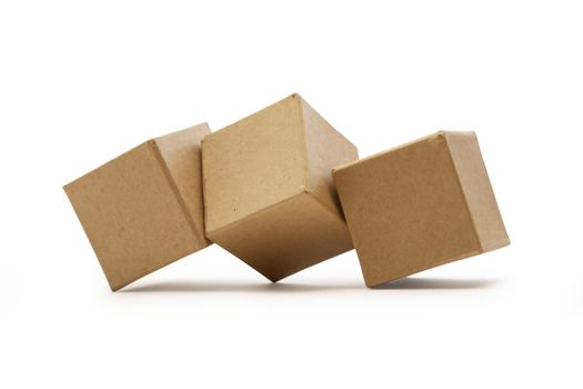 Set of brown cardboard cubes isolated on white background with clipping path