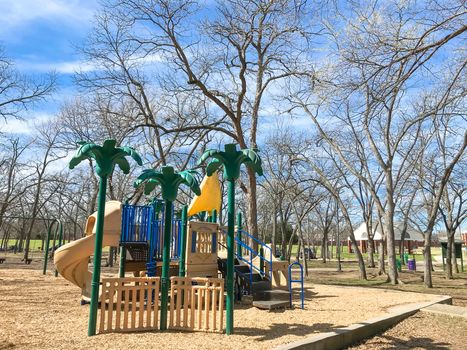 Colorful playground at sunny day of wintertime in Lewisville, Texas, USA.