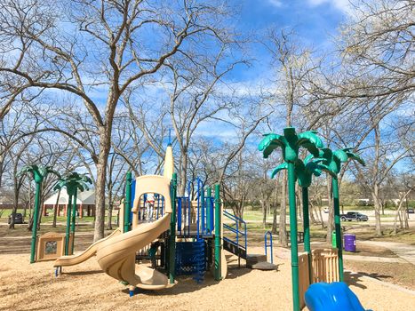 Colorful playground at sunny day of wintertime in Lewisville, Texas, USA.