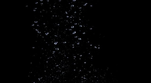 Blurry images of soda liquid water bubbles or carbonate drink or oil shape or beer fizzing or splashing and floating drop in black background for represent sparkling and refreshing