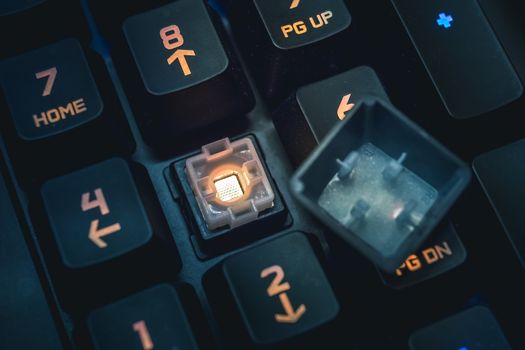 Romer-G backlit mechanical keyboard numerical buttons detail shot. Gaming Keys.