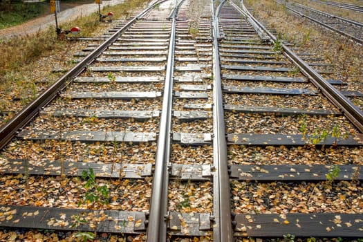 two railway lines going to the perspective of sunny days.