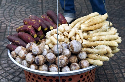 Fruit basket of a street vendor in Vietnam