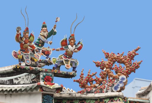 Warriors on a roof of a Vietnamese palace