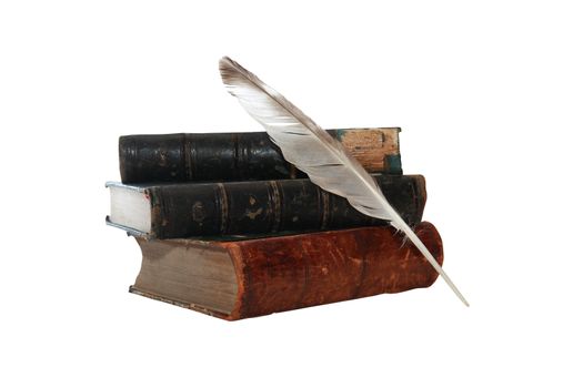 Old books and quill pen isolated on white background with clipping path