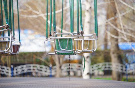 Empty chain swing in amuzement park