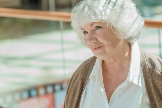 Portrait of beautiful senior woman with white hair