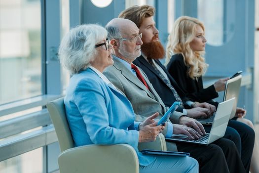 Business group in a meeting watching presentation