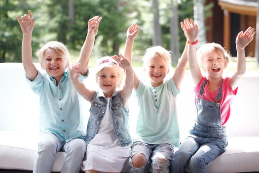 Group of happy smiling children outdoors