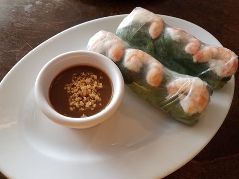 Vietnamese rice paper rolls with shrimp and peanut dipping sauce