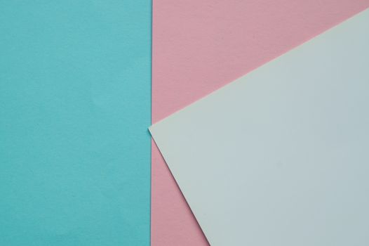 Blue, pink and white color paper geometric flat lay three background next.