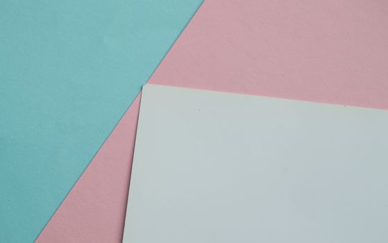 Blue, pink and white color paper geometric flat lay three background next.