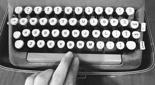 Old typewriter machine in good condition with no paper in feed for use in the past job career such as write office document, copywriter, author, news journalist, secretary, creative and more. 