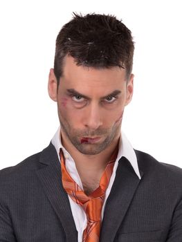 Close up of a businessman with bloody lip, beaten and bruised, isolated