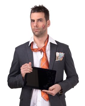 Beaten business man, tablet in hand, isolated on white