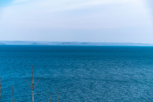 Sea view from the city of Vladivostok. Mountains on the other side of the sea.