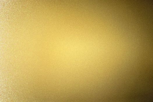 Abstract texture background, reflection brushed gold metallic wall in dark room