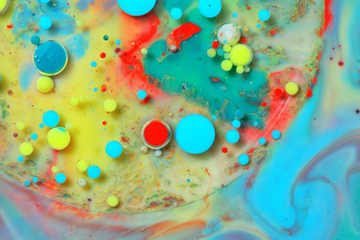 Water, milk and oil closeup colorful abstract
