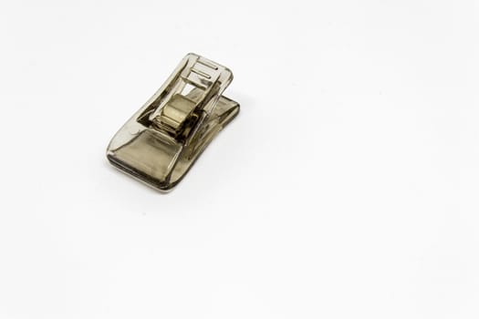 a paper clip with white background. this is isolated object photo.