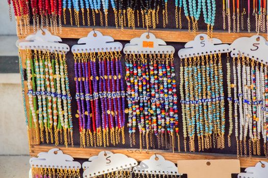 Colorful beads of various color at a market