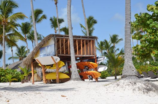 Kayaks and canoes on the beach in the Dominican Republic