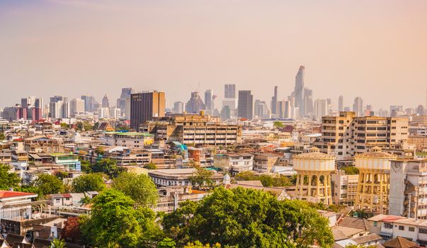Bangkok City downtown cityscape urban skyline in the mist or smog. Wide and High view image of Bangkok city in the soft light