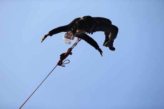 Jumping from the bridge with a rope. RoupeJumping.