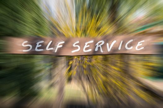 Sign with written "self service", blur background,horizontal photo.