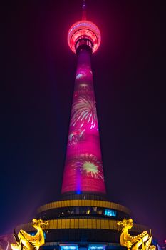 The Central Radio and Television Tower at night with colorful illumination, Beijing, China.