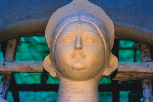 Kumartuli,West Bengal, India, 2016: Handmade clay model of "Maa Devi Durga" under construction in Kumortuli, is a traditional potters’ quarter in north Kolkata, before city famous Bengali festival.