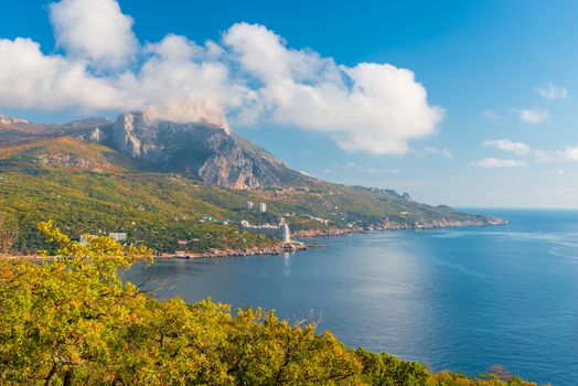 Top view of the bay of the sea and the mountain, beautiful clouds on a sunny day