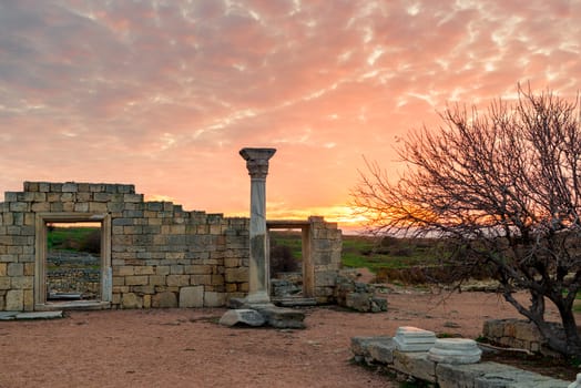 ruins of Ancient Chersonesos in the Crimea, Russia. Landscape in the rays of the setting sun