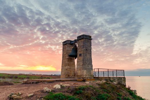 View of the big bell at sunset, Ancient Chersonese in Crimea, Russia