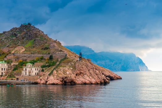 Mountains in the Balaklava Bay in Crimea, dramatic sky above the sea and mountains
