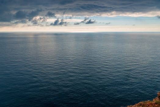 The blue sea and black storm clouds, the elements of a beautiful landscape