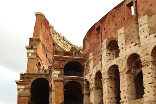 Colosseum in Rome, Italy, Europe. Rome is an ancient arena of gladiatorial combat. The Roman Colosseum is the most famous landmark of Rome and Italy.