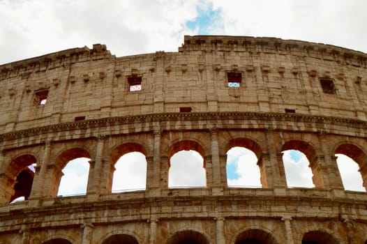 Colosseum in Rome, Italy, Europe. Rome is an ancient arena of gladiatorial combat. The Roman Colosseum is the most famous landmark of Rome and Italy.