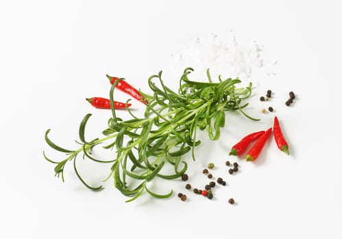 Rosemary, peppercorns and red chili peppers - studio shot