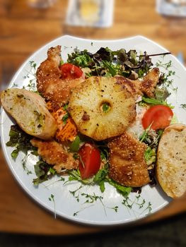 Crunchy low carb schnitzel with pineapple